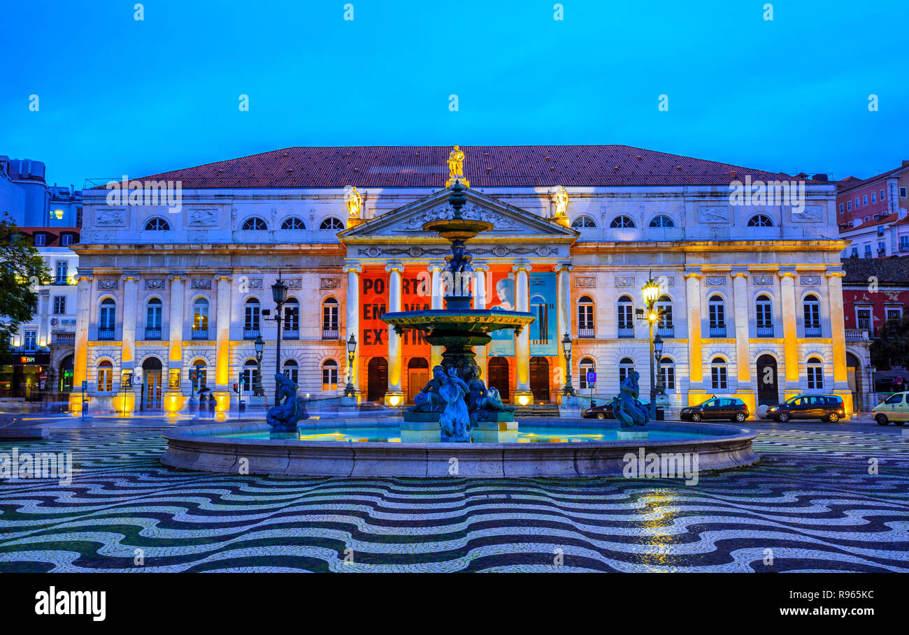 Lisbon, Portugal - March 18, 2018: Night scene in Rossio square with National Theater illuminated by lights Stock Photo