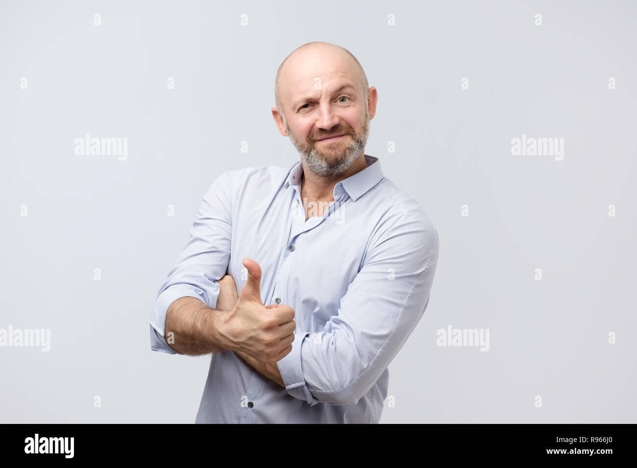 Young european man with thumb up. Positive mood Stock Photo