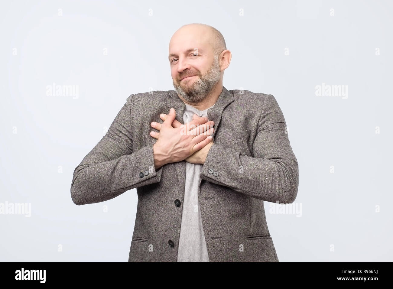 Pleased male glad to recieve compliment from woman. Stock Photo