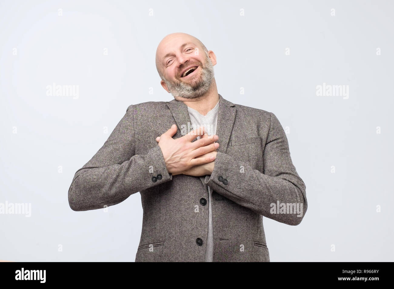 Pleased male glad to recieve compliment from woman. Stock Photo