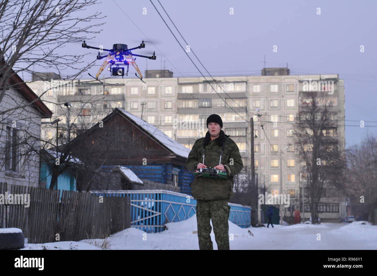 Kovrov, Russia. 16 December 2012. Young man flight controls the hexacopter with a camera Stock Photo