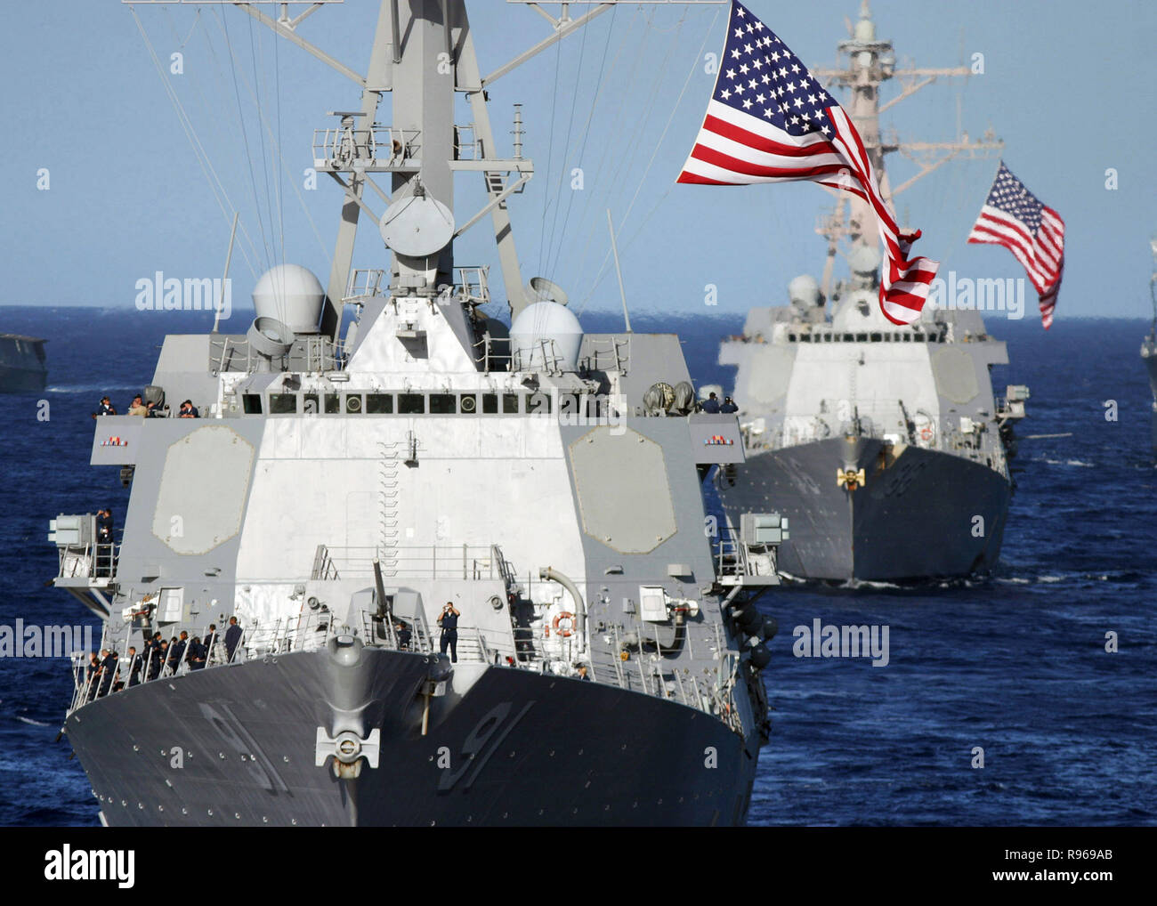 The guided-missile destroyers USS Pinckney (DDG 91) and USS Shoup (DDG 86) sail in formation in the Pacific Ocean off the coast of Hawaii.   DoD photo by Chief Petty Officer Walter T. Ham IV, U.S. Navy Stock Photo