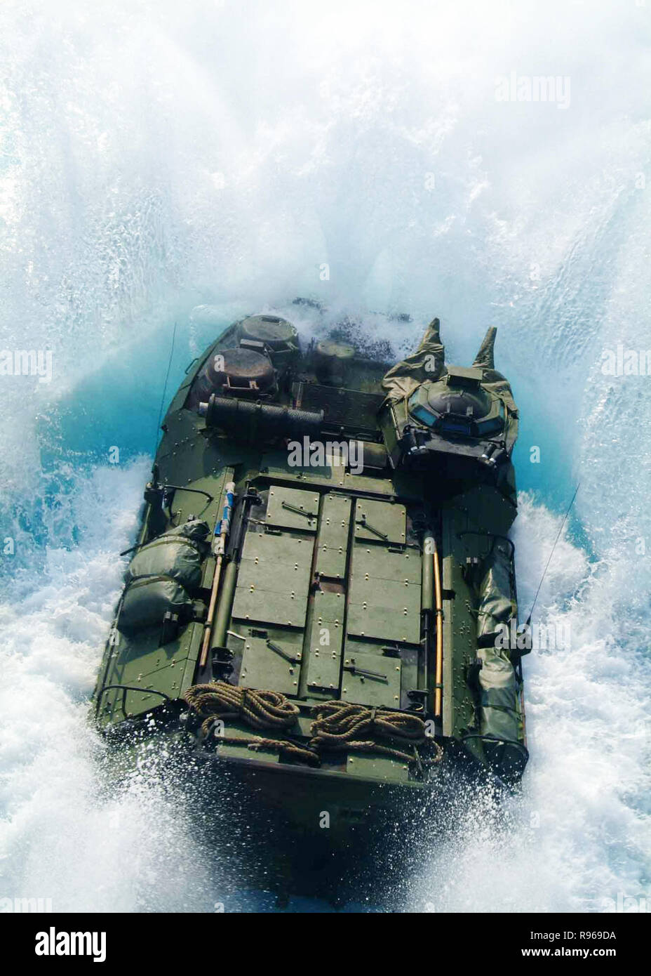 An amphibious assault vehicle launches from the well deck of the USS Harpers Ferry (LSD 49) off the coast of Okinawa, Japan.  DoD photo by Petty Officer 3rd Class Mark Alvarez, U.S. Navy. Stock Photo