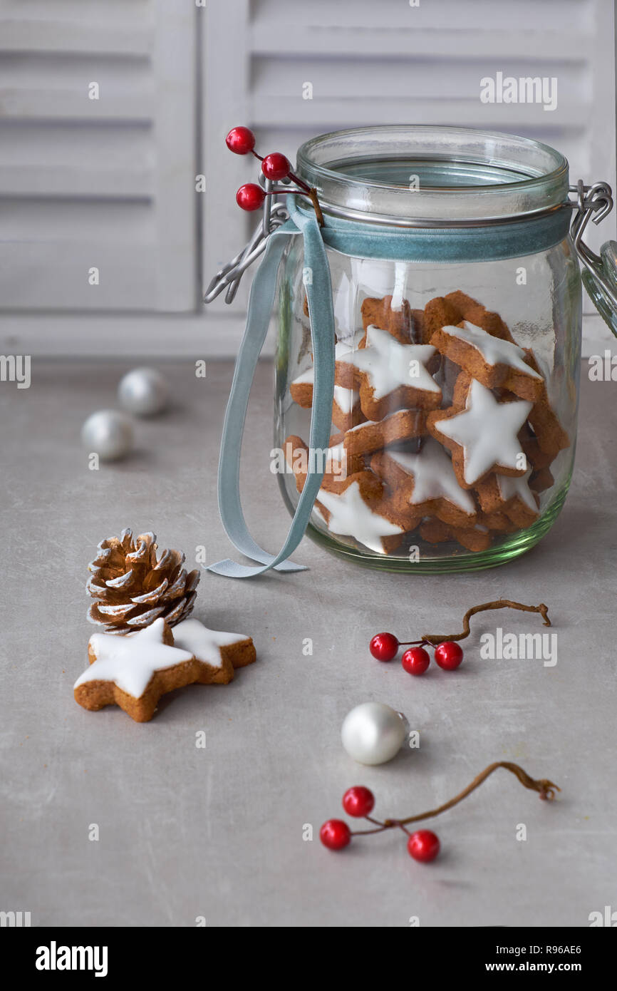 Christmas Background With Tasty Star Ginger Cookies In A Glass Jar