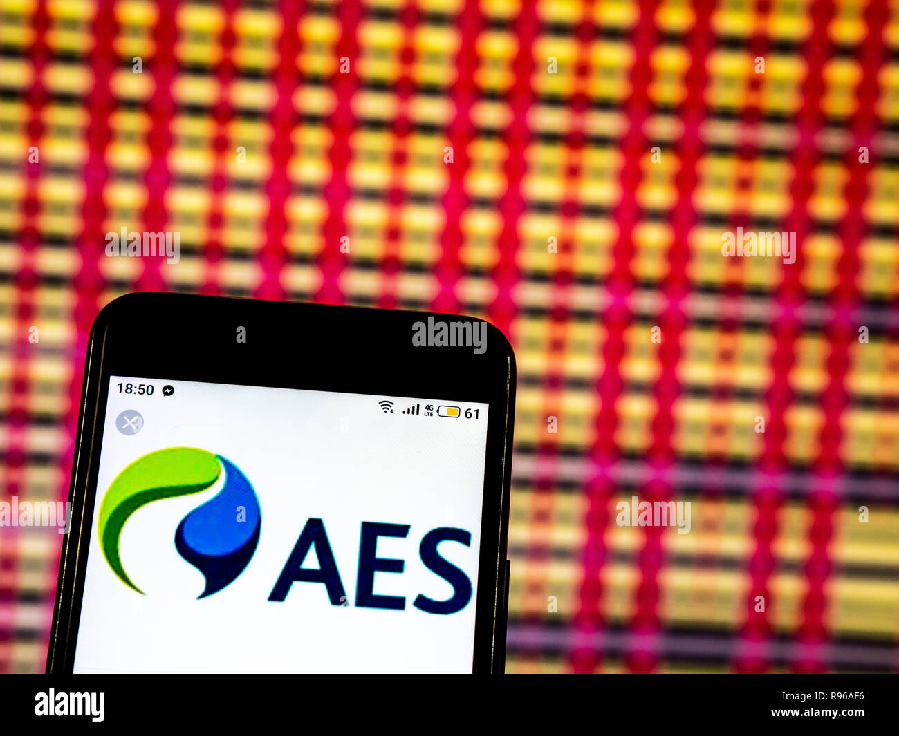 AES Corporation Electric power distribution company logo seen displayed
