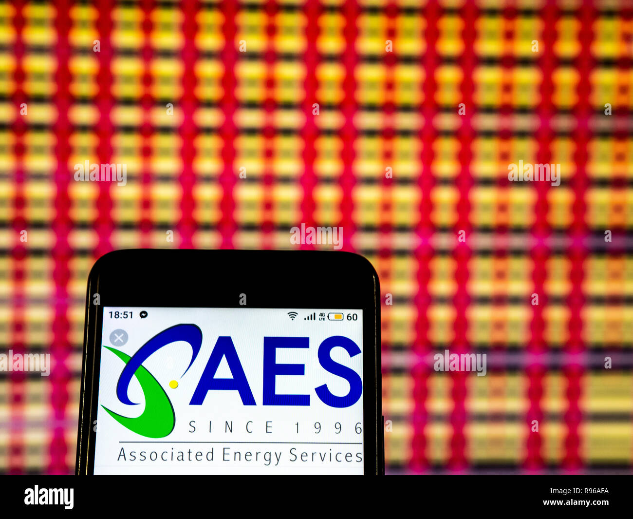 AES Corporation Electric power distribution company logo seen displayed