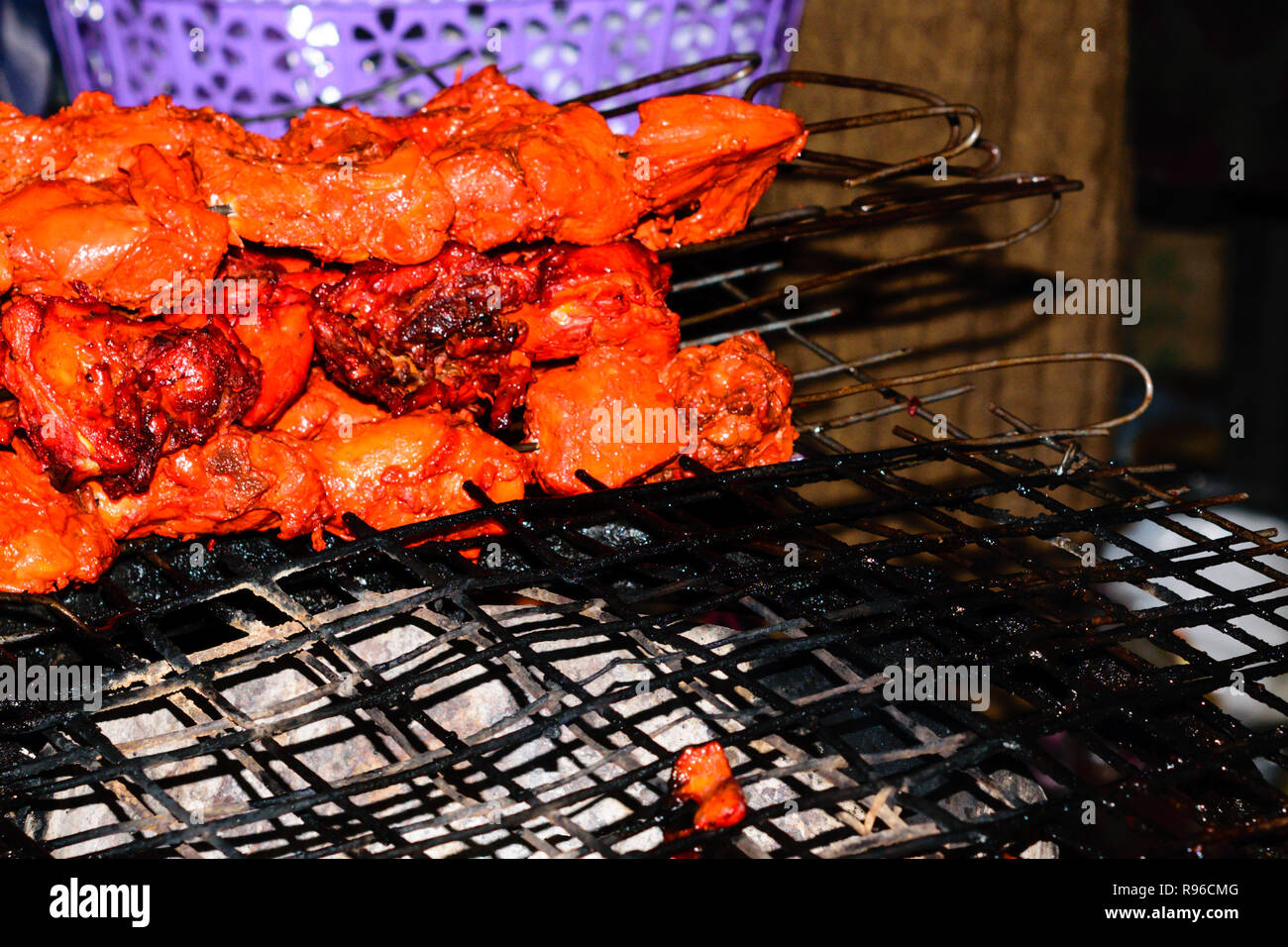 Shish kebab preparation on barbecue grill over charcoal. Roast ...
