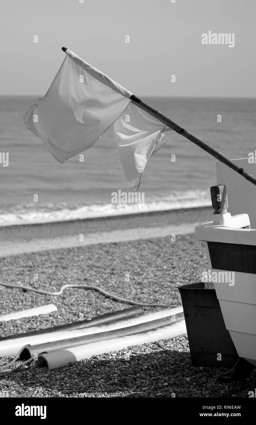 dan bouy flags on beached longshore boat, Sizewell Suffolk, England UK Stock Photo