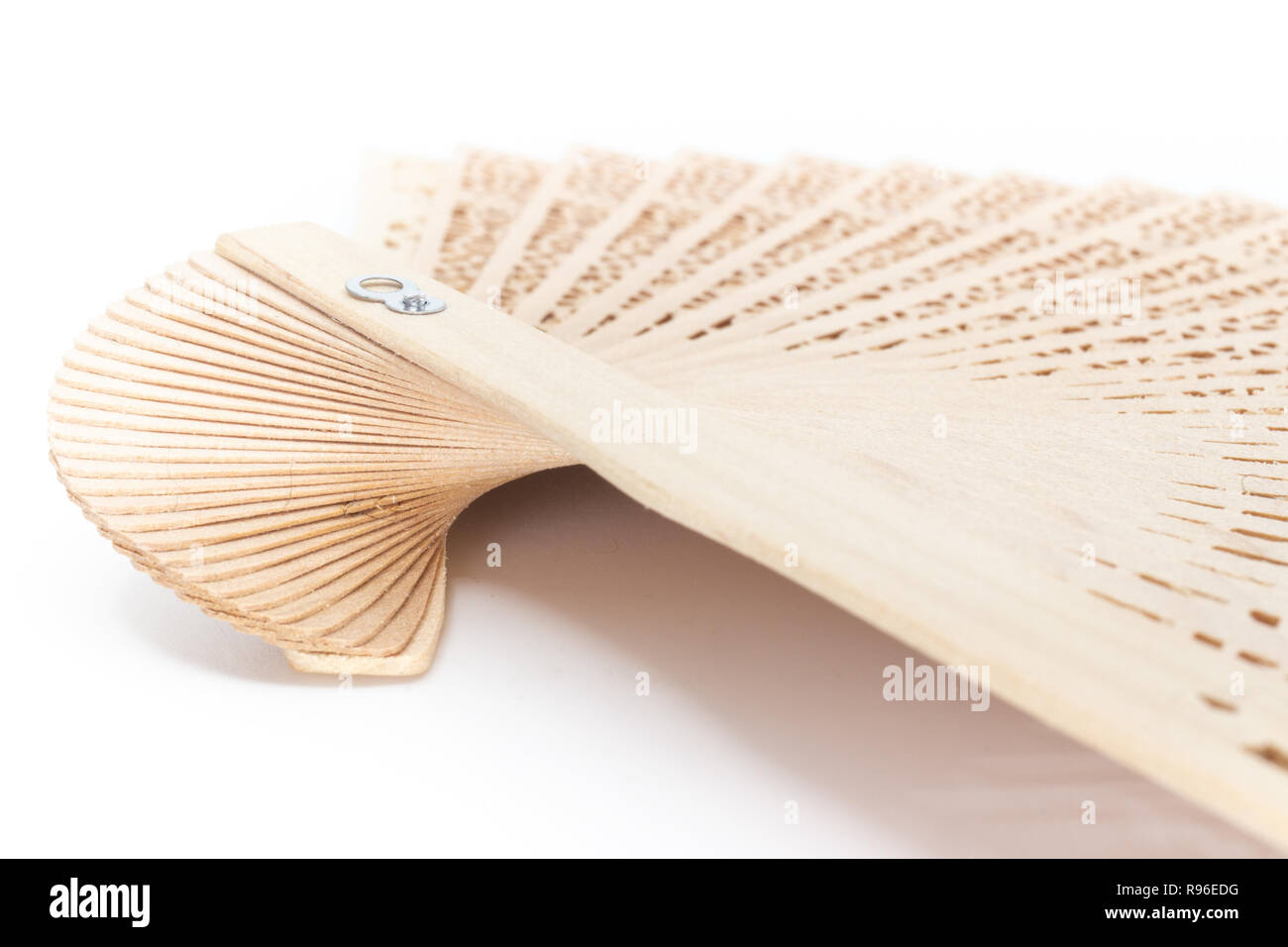 Open wooden folding handheld fan handle detail side view isolated on