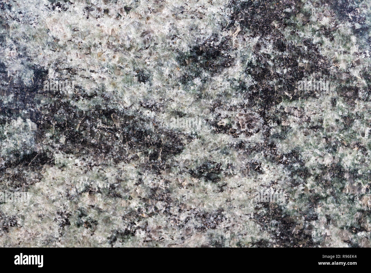 Granite texture macro. White, black, grey. Stock Photo