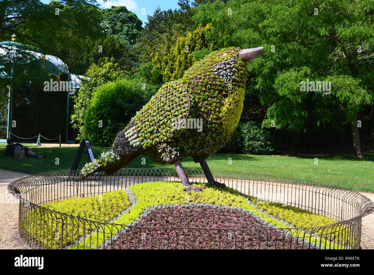 Bird sculpture beside the aviaries at Waddesdon Manor, Aylesbury, Buckinghamshire. UK. Entertainment in the gardens. Stock Photo