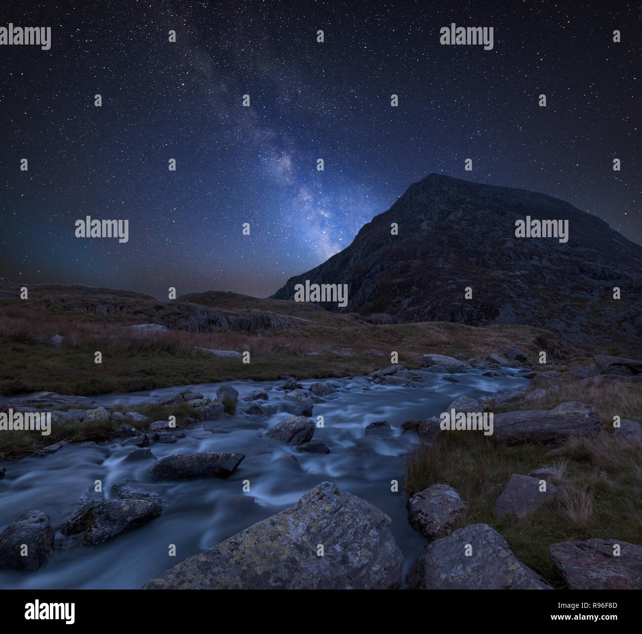 Stunning vibrant Milky Way composite image over Landscape image of ...