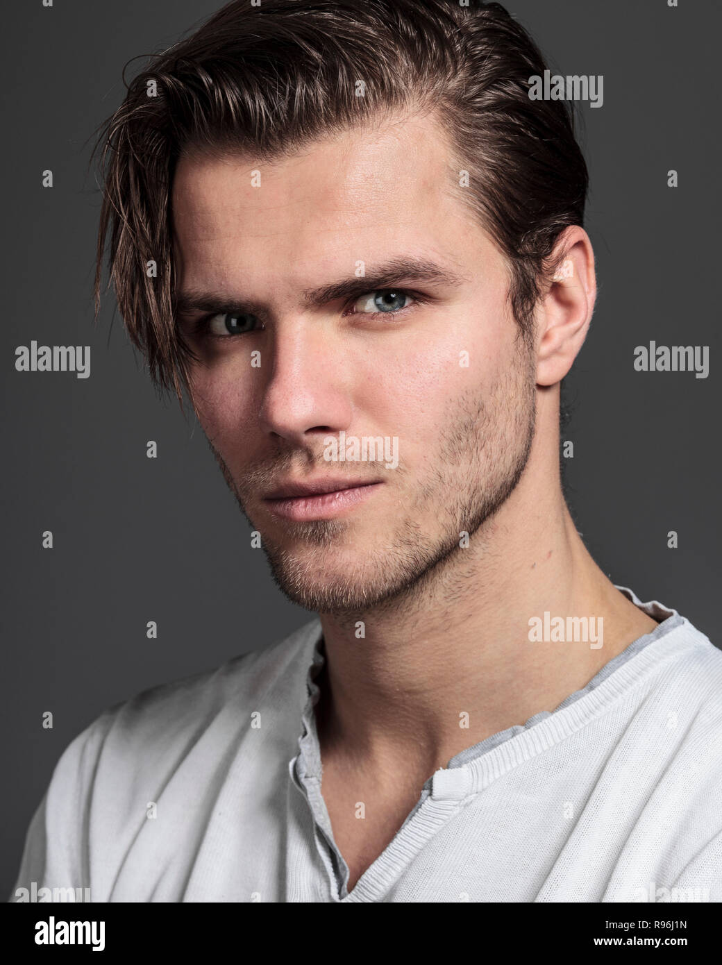 Studio photoshoot of a good looking young man Stock Photo - Alamy