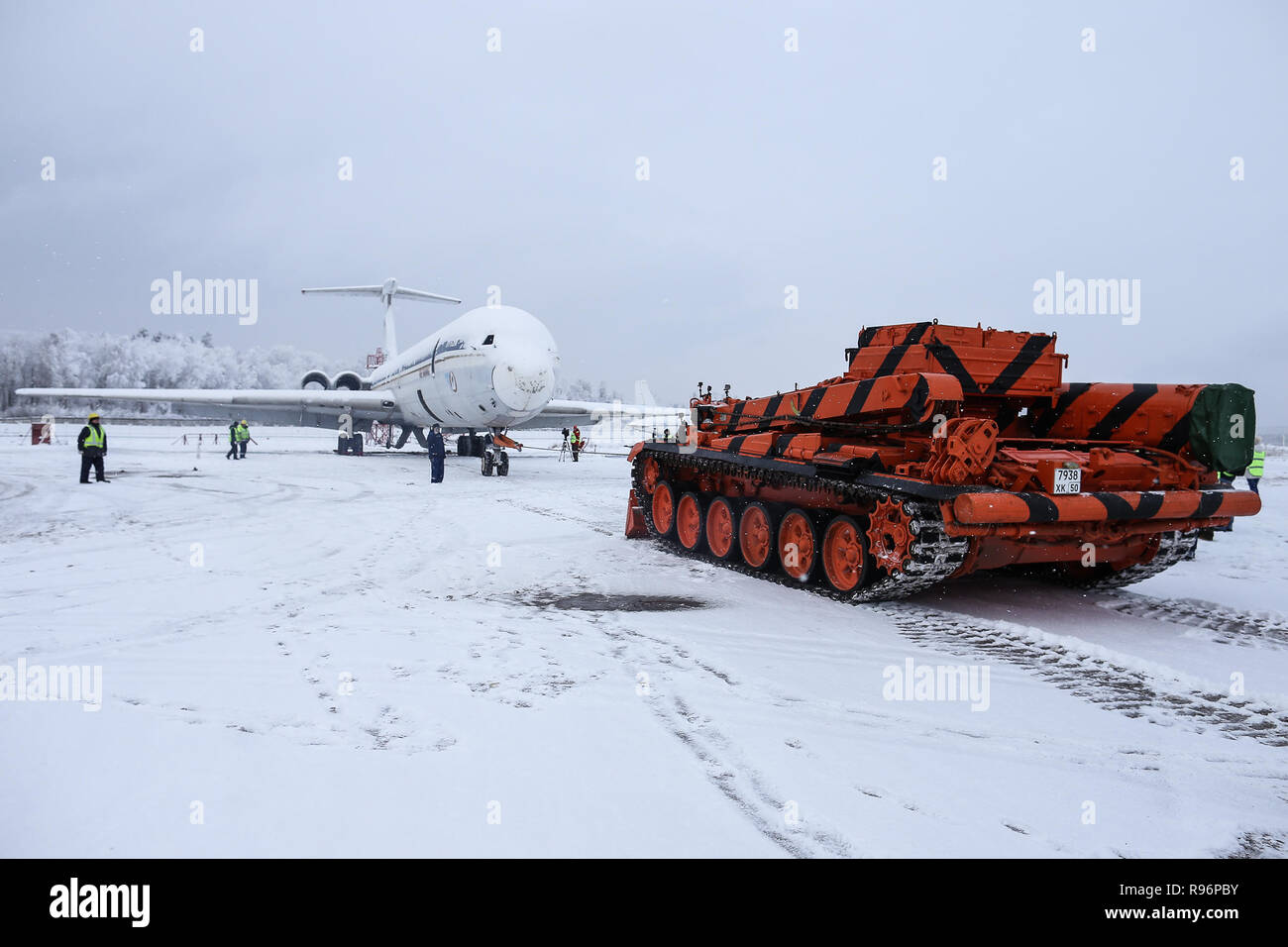 Beijing, Russia. 19th Dec, 2018. An armoured recovery vehicle shows its performance at Domodedovo Airport in Moscow, Russia, on Dec. 19, 2018. The armoured recovery vehicle is able to tow a weight of 125 tons or double-decked airplane through snow and forest area. Credit: Evgeny Sinitsyn/Xinhua/Alamy Live News Stock Photo