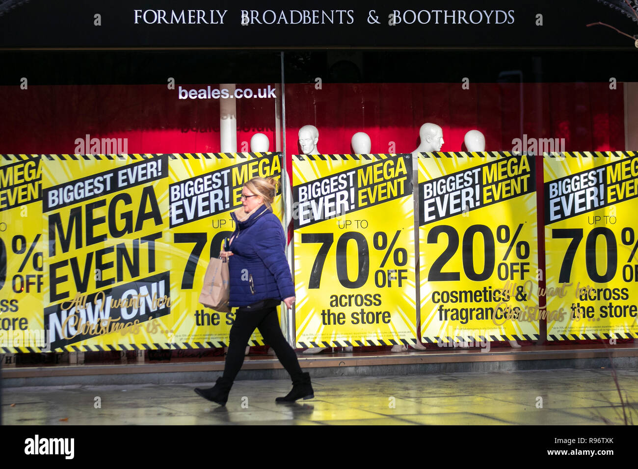 Southport, Merseyside, UK. 20th Dec, 2018. Wet & windy day for Beales Christmas shoppers as the Biggest Mega event ever sale signs go up in Beales retail outlets discounting items across the store in an attempt to stimulate festive high street sales. Credit: MediaWorldImages/Alamy Live News Stock Photo