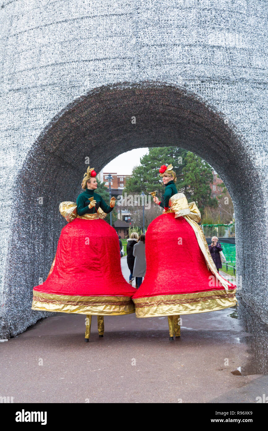 Bournemouth Dorset Uk th December 18 Ding And Dong The Christmas Belles Duo Charming Christmas Bells On Stilts Wander Around Bournemouth Lower Gardens Shimmering Scarlet And Gold Ribbons Ringing Out Yuletide Chimes