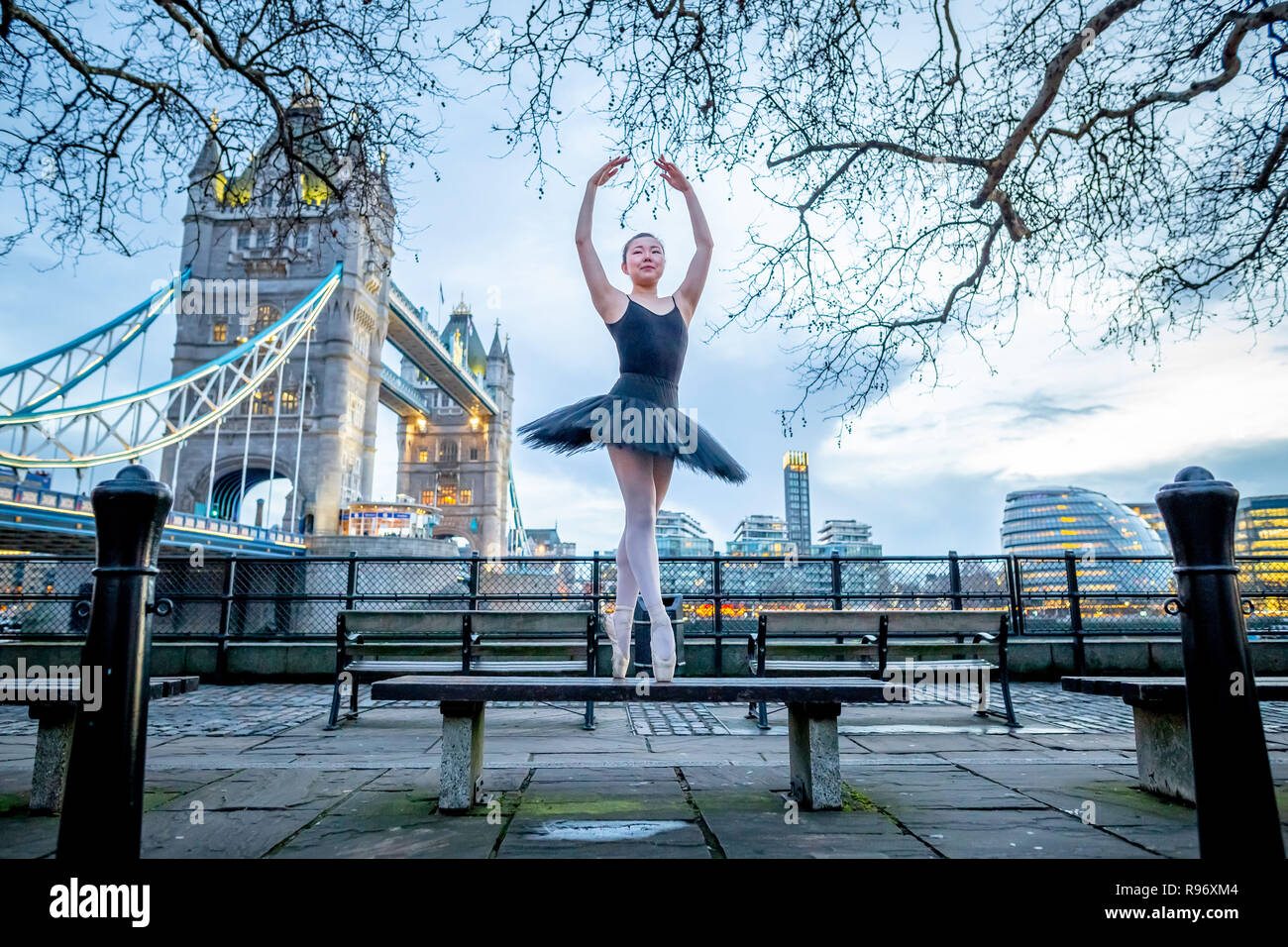 London, UK. 20th December, 2018. Dancers from Semaphore Ballet Company perform at Tower Hill in the last evening light before the winter solstice. Tonight will be the longest night of the year with the sun not rising until 08:03 GMT on Friday morning. Dancer pictured: Natsuki Uemura. Credit: Guy Corbishley/Alamy Live News Stock Photo