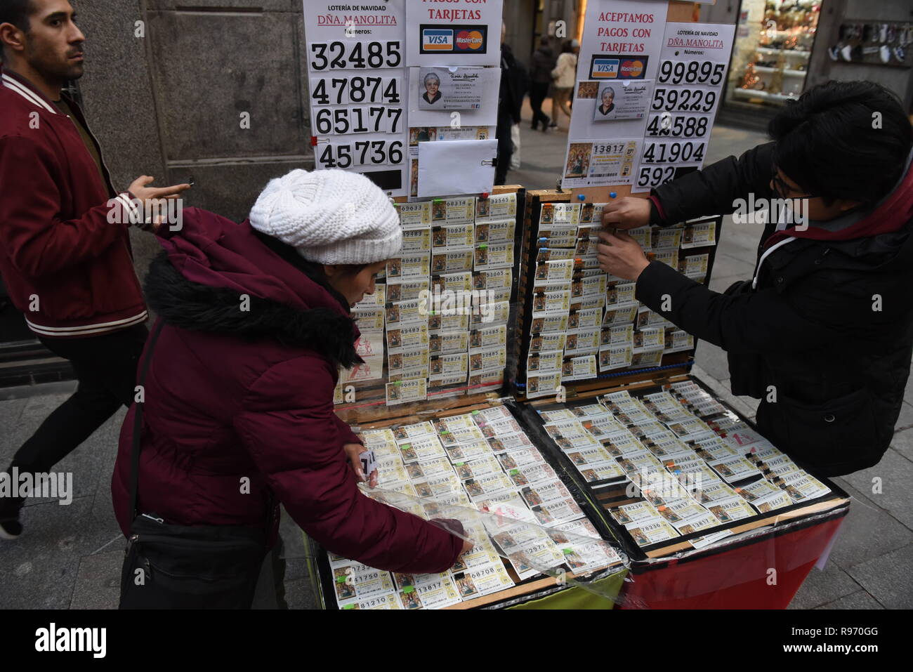 Madrid, Spain. 20th Dec, 2018. Vendors of tickets of the El Gordo Christmas lottery seen in Madrid.The famous draw El Gordo would be celebrated on December 22, 2018. More than 2.3 billion euros ($3 billion) in prizes would be distributed. Credit: John Milner/SOPA Images/ZUMA Wire/Alamy Live News Stock Photo