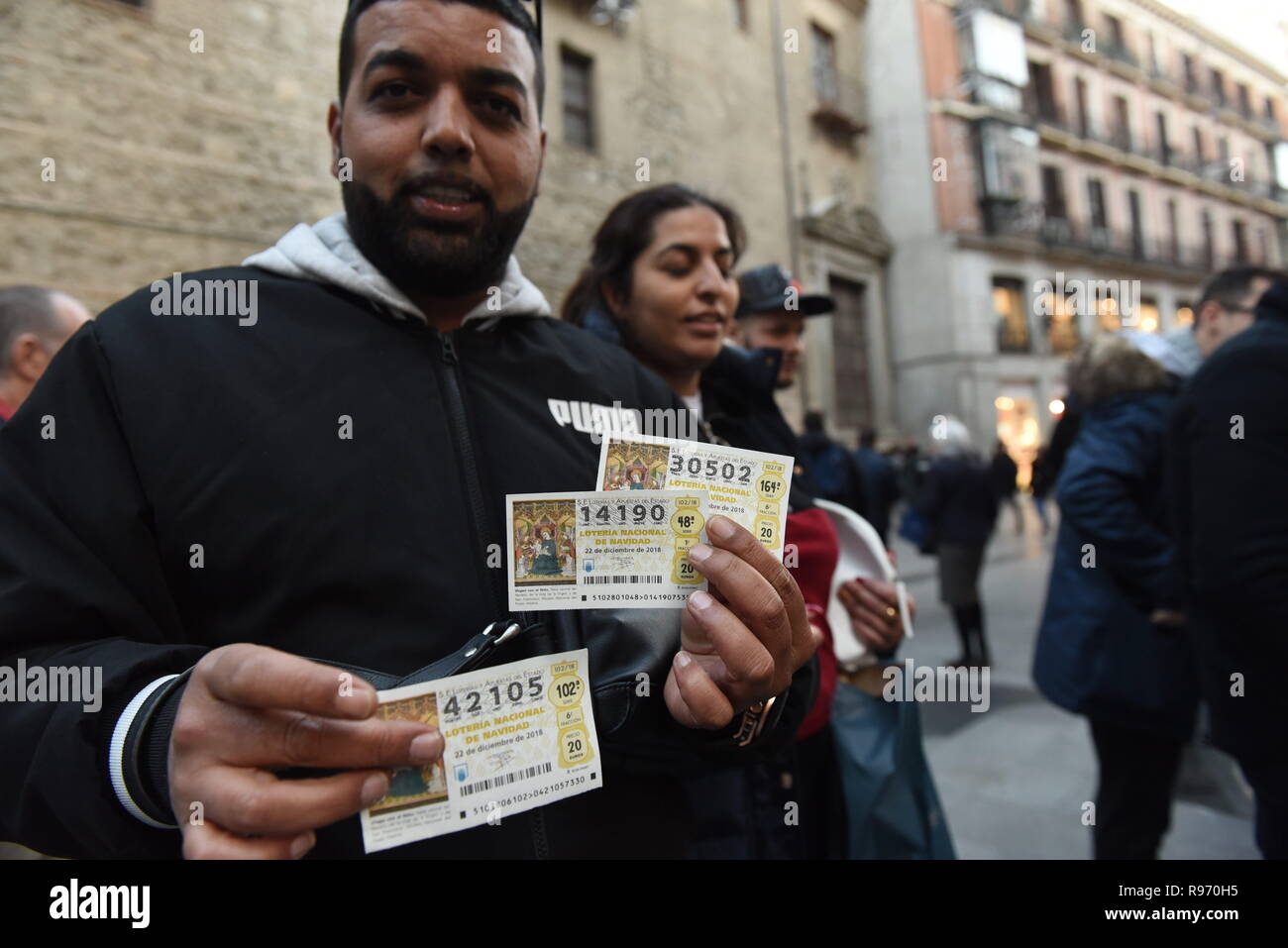Madrid, Spain. 20th Dec, 2018. A man seen with his Spanish Christmas El Gordo lottery tickets in Madrid.The famous draw El Gordo would be celebrated on December 22, 2018. More than 2.3 billion euros ($3 billion) in prizes would be distributed. Credit: John Milner/SOPA Images/ZUMA Wire/Alamy Live News Stock Photo