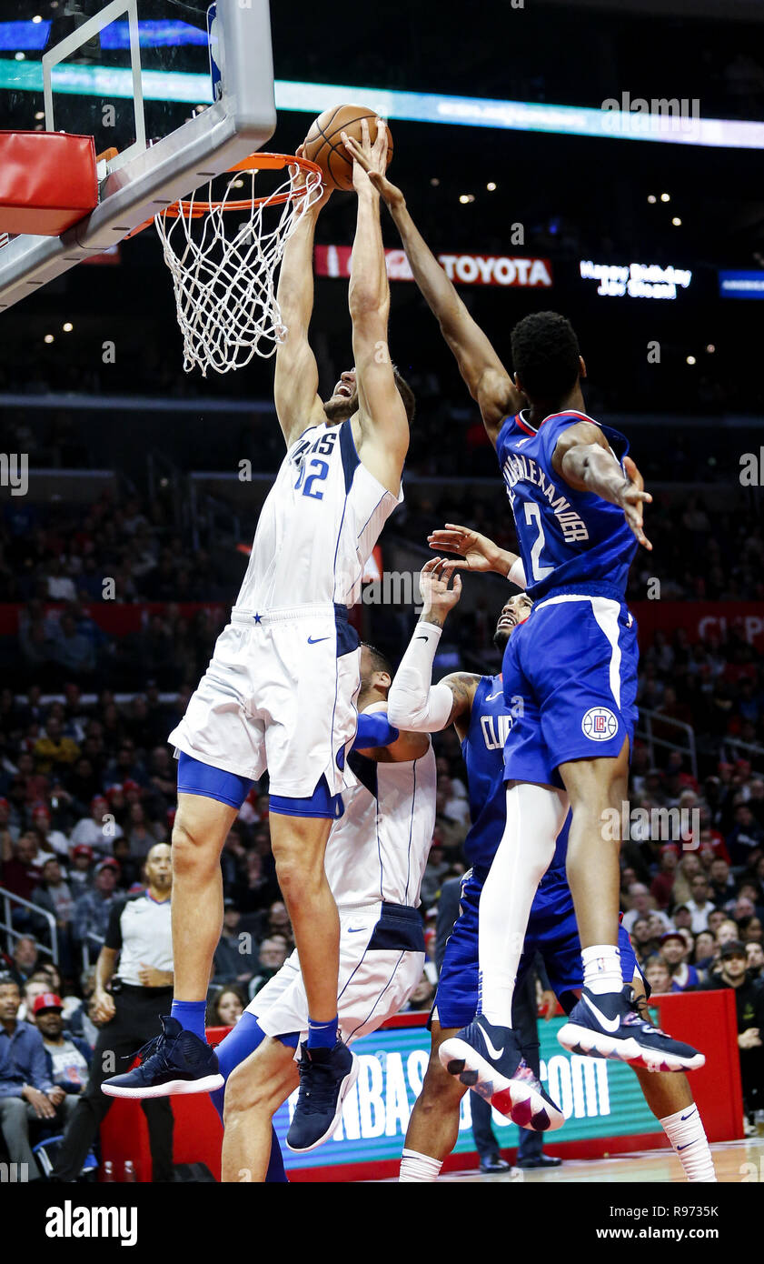 Los Angeles, California, USA. 20th Dec, 2018. Dallas Mavericks' Maximilian  Kleber (42) dunks while defended by Los Angeles Clippers' Shai  Gilgeous-Alexander (2) in an NBA basketball game between Los Angeles  Clippers and