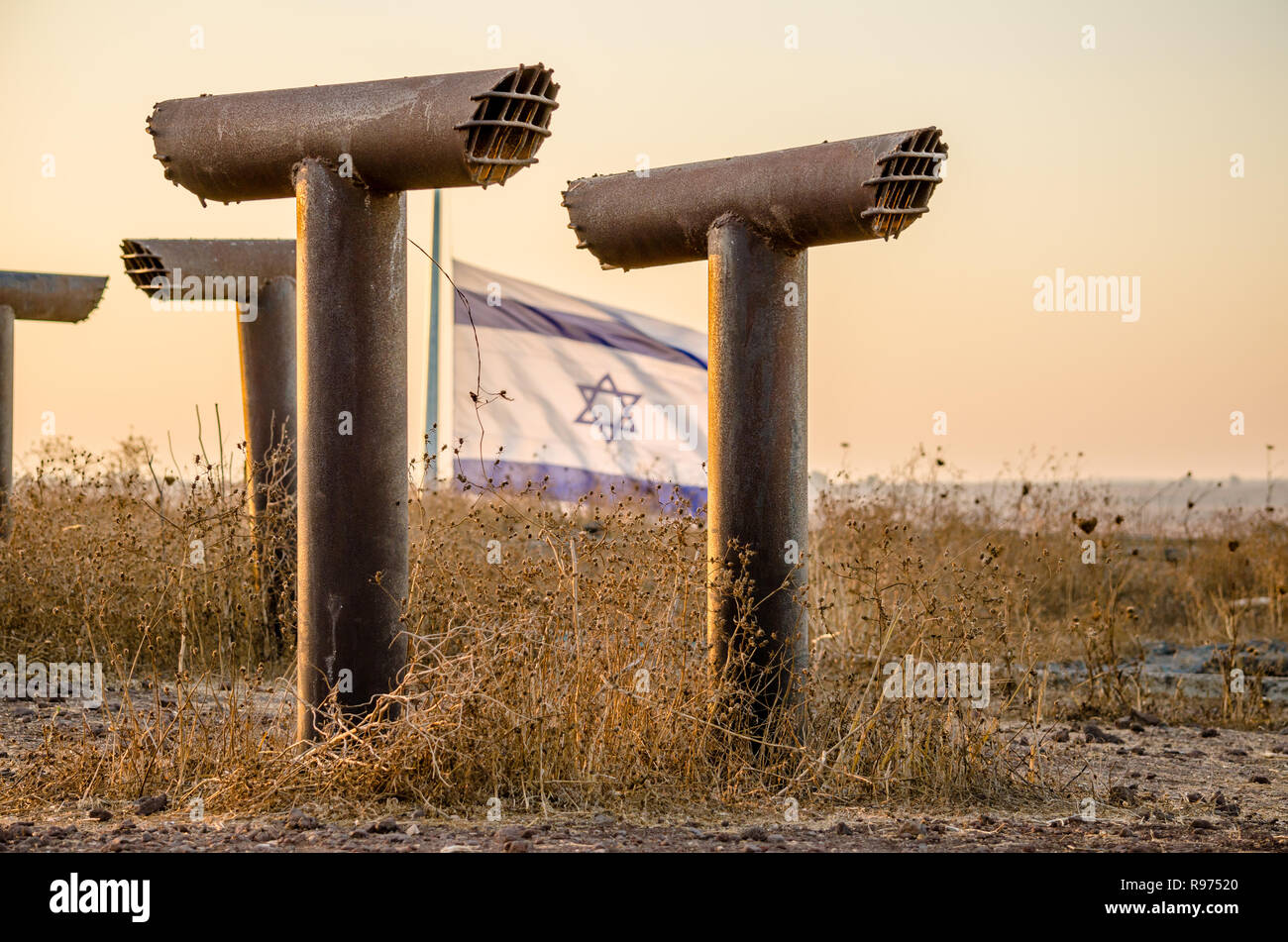 Periscopes frame the Israeli flag flying above the fortifications at Tel Saki in Israel’s Golan Heights, site of the Yom Kippur War of 1973 Stock Photo