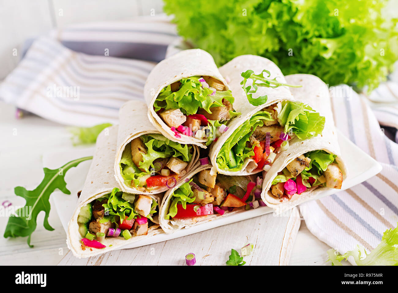 Chicken burrito. Healthy lunch. Mexican street food fajita tortilla