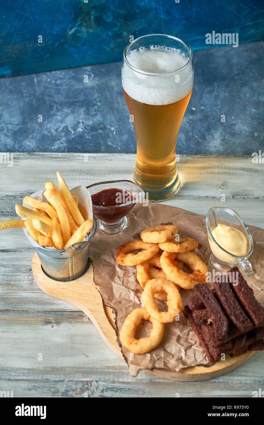 a variety of snacks for light beer in a glass Stock Photo
