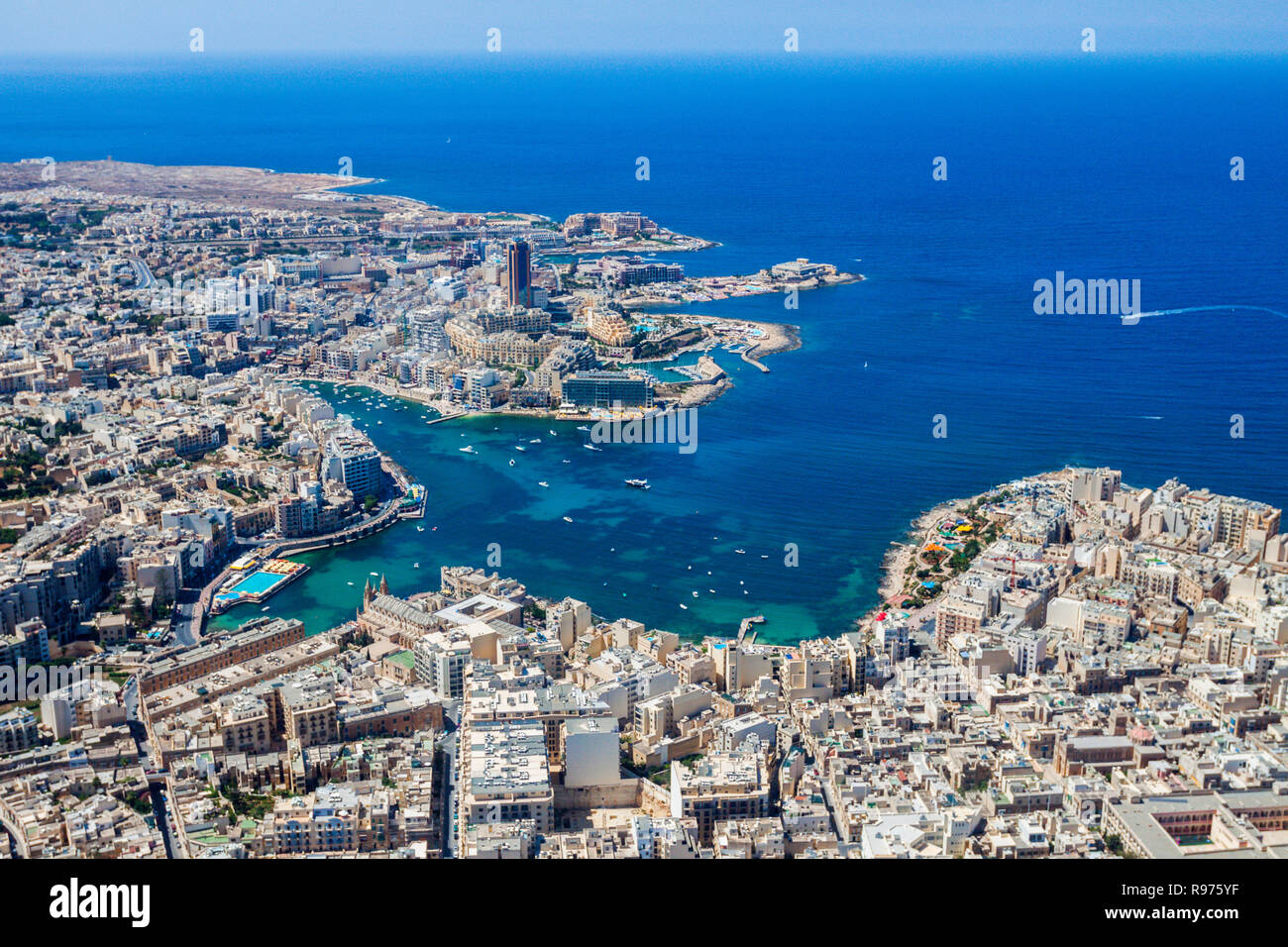 Malta aerial view. St. Julian's (San Giljan) and Tas-Sliema cities. St. Julian’s bay, Balluta bay, Spinola bay, Towns, harbours and coastline of Malta from above. Skyscraper in Paceville district. Stock Photo