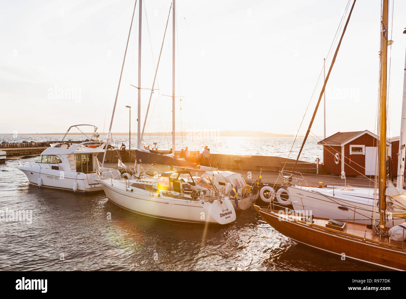 Boats at sunset at the Hano harbor in Sweden Stock Photo