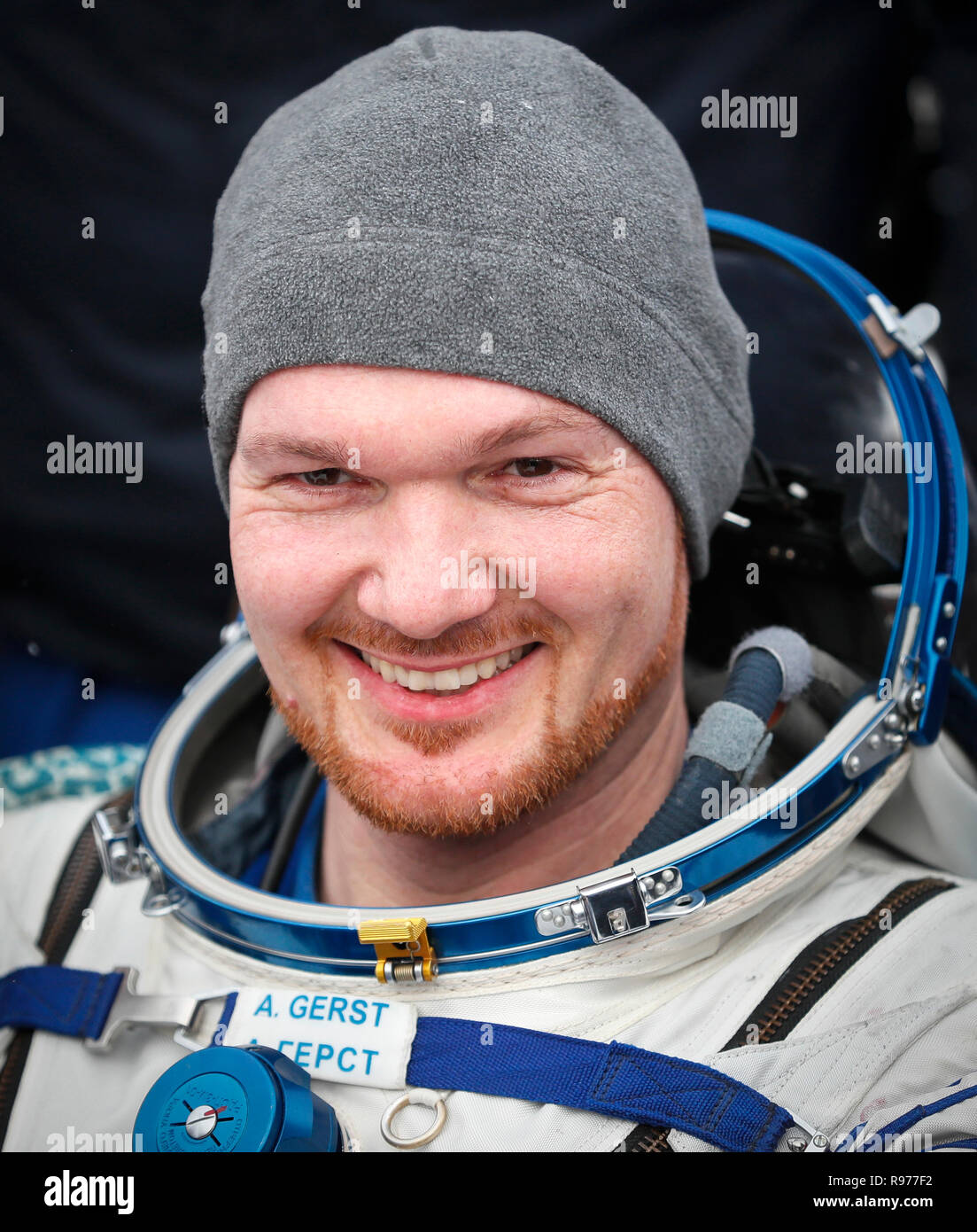 International Space Station (ISS) crew member astronaut Alexander Gerst, of Germany, smiles after landing in a remote area outside the town of Zhezkazgan, formerly known as Dzhezkazgan, Kazakhstan, on Thursday, Dec. 20, 2018. Three astronauts have returned to Earth after more than six months aboard the International Space Station. (Shamil Zhumatov/Pool via AP) Stock Photo
