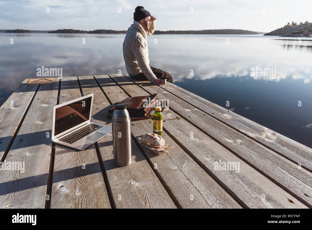 Man fishing using laptop on hi-res stock photography and images - Alamy