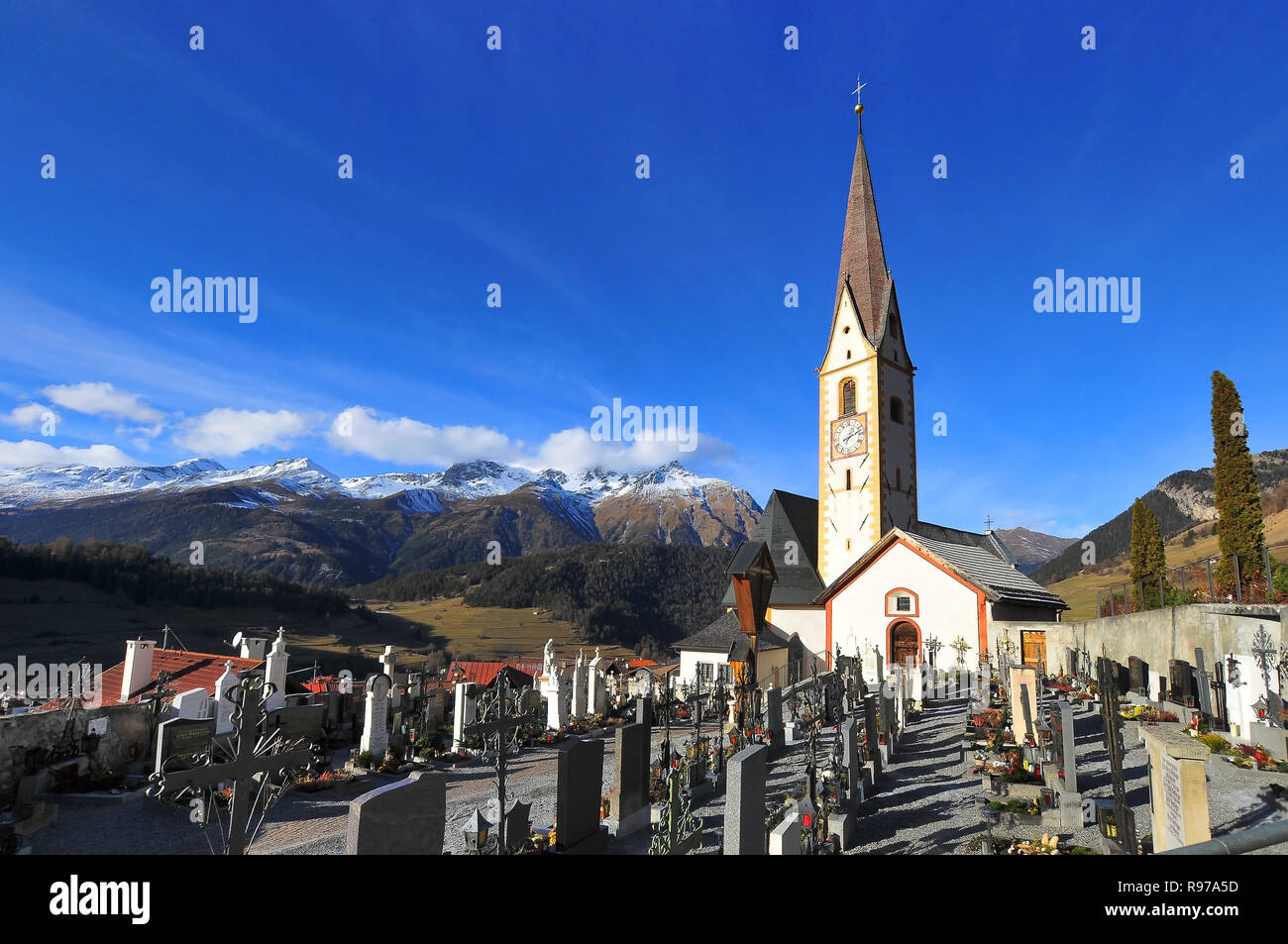 St. Valentine's Church in Nauders, in the background the Samnaungruppe (3146 m), Tyrol, Austria, Europe Stock Photo
