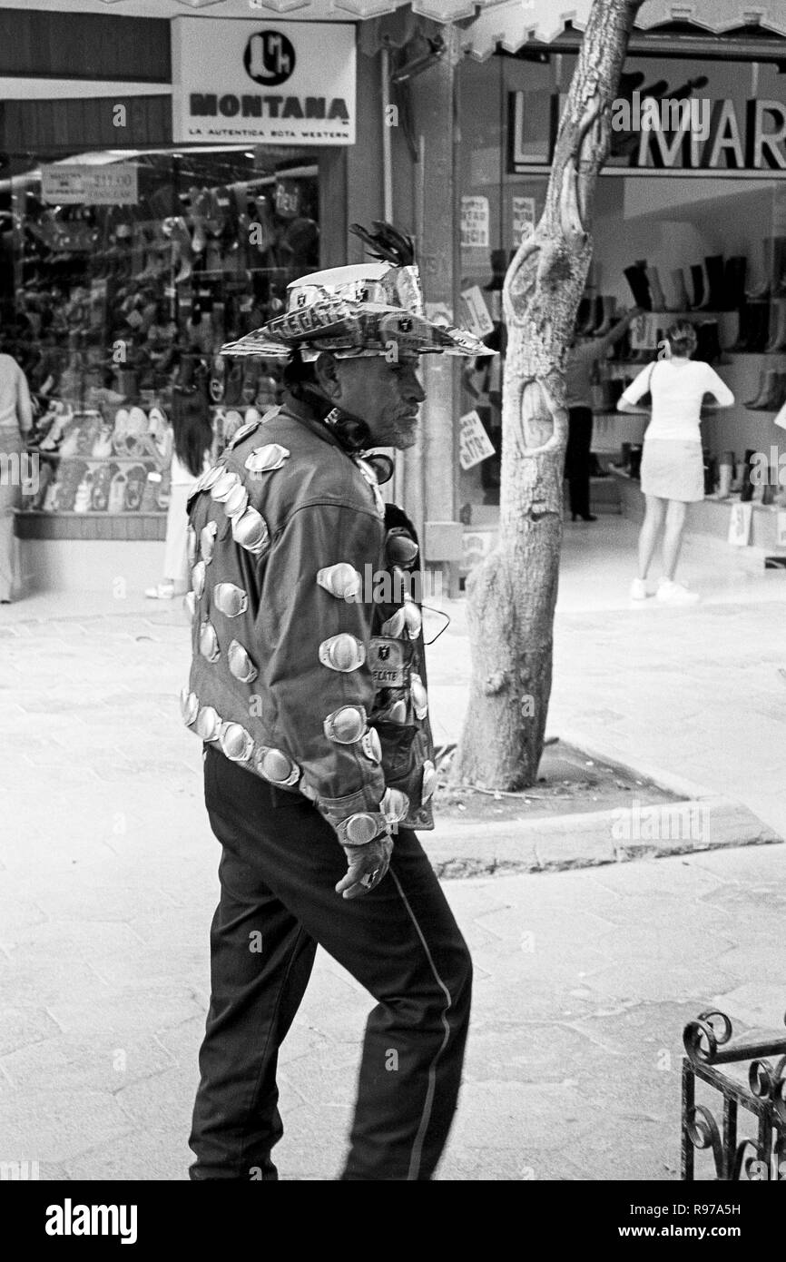 MONTERREY, NL/MEXICO - NOV 2, 2003: The 'Tecate Man', a local street character in downtown, with his costume made of Tecate beer cans Stock Photo
