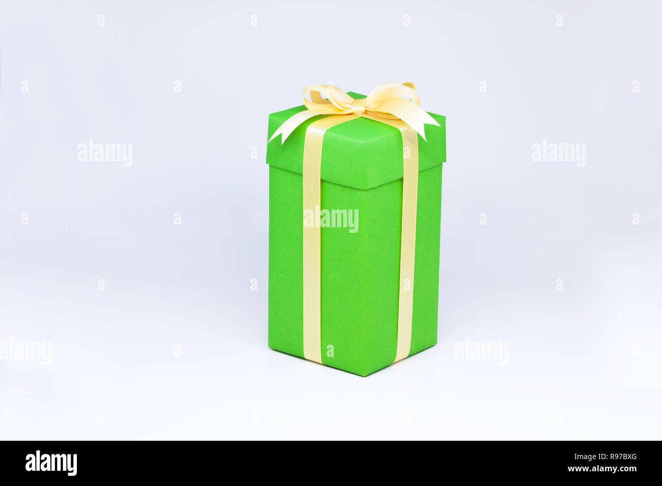 Green gift box on isolated on white background Stock Photo - Alamy