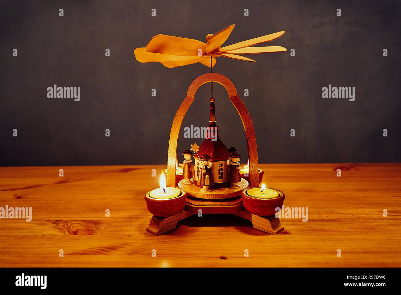 german christmas pyramid from the erzgebirger with christmas carolers