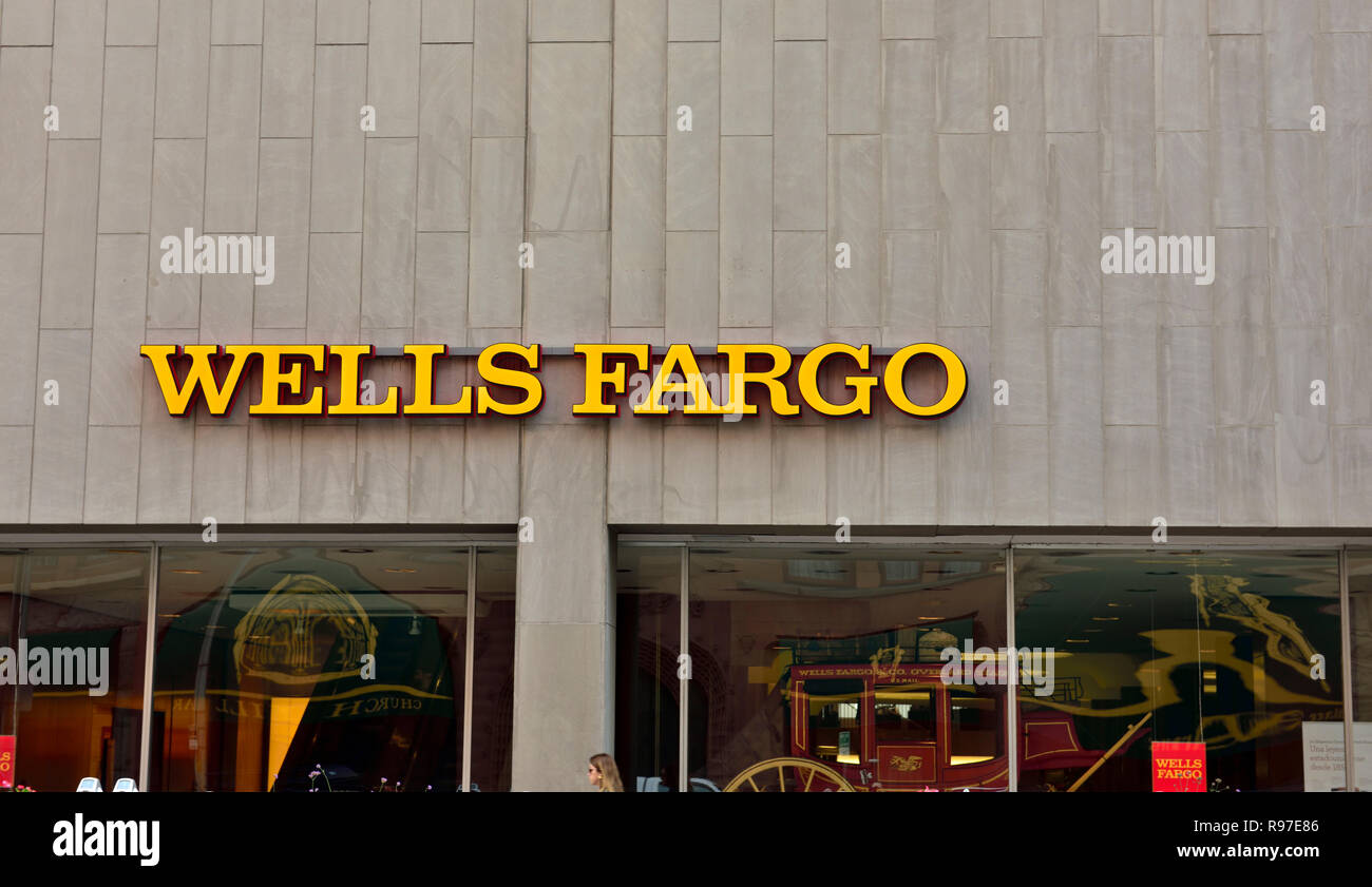 Wells Fargo sign outside on bank building Stock Photo