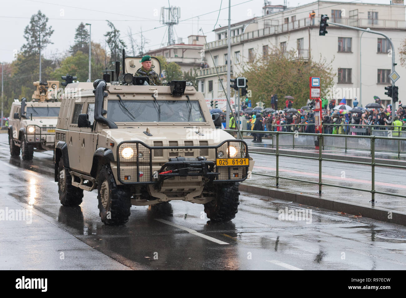 European street, Prague-October 28, 2018: Soldiers of Czech Army are riding Iveco LMV  on military parade on October 28, 2018 in Prague, Czech Republi Stock Photo