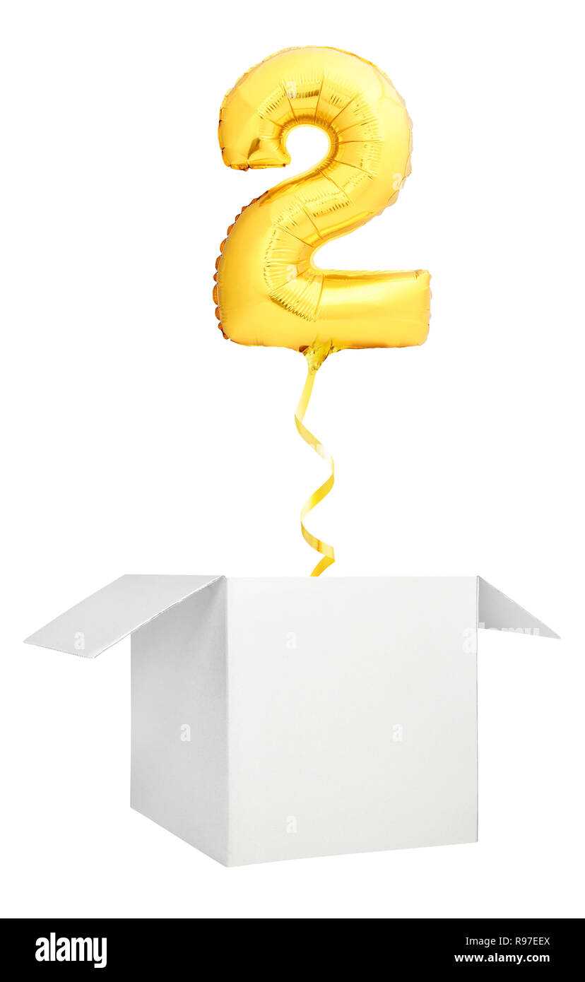 Golden number two balloon flying out of blank white box isolated on white background Stock Photo