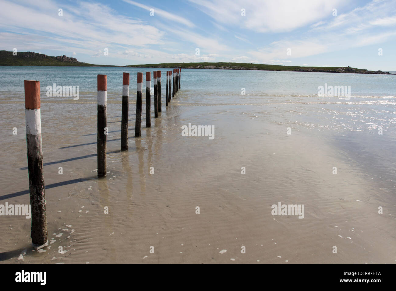 Mooring post on a beach in Langebaan South Africa Stock Photo