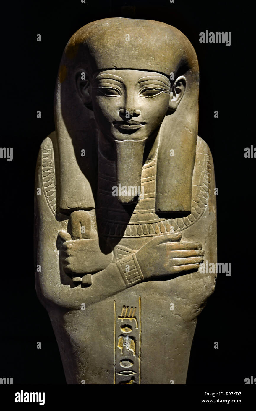 Oesjebti - (Ushebti ) from Tjel. limestone Period: New Empire; 18th Dynasty; Amenhotep III 1388-1351 BC (Tjel is Mayor of Memphis at the time of Pharaoh Amenhotep III.) His wife Ipay is 'singer of Amon and nurse of the king.' Their mummy-shaped tombs indicate their lofty status in the realm of the dead.) Egypt, Egyptian. Stock Photo