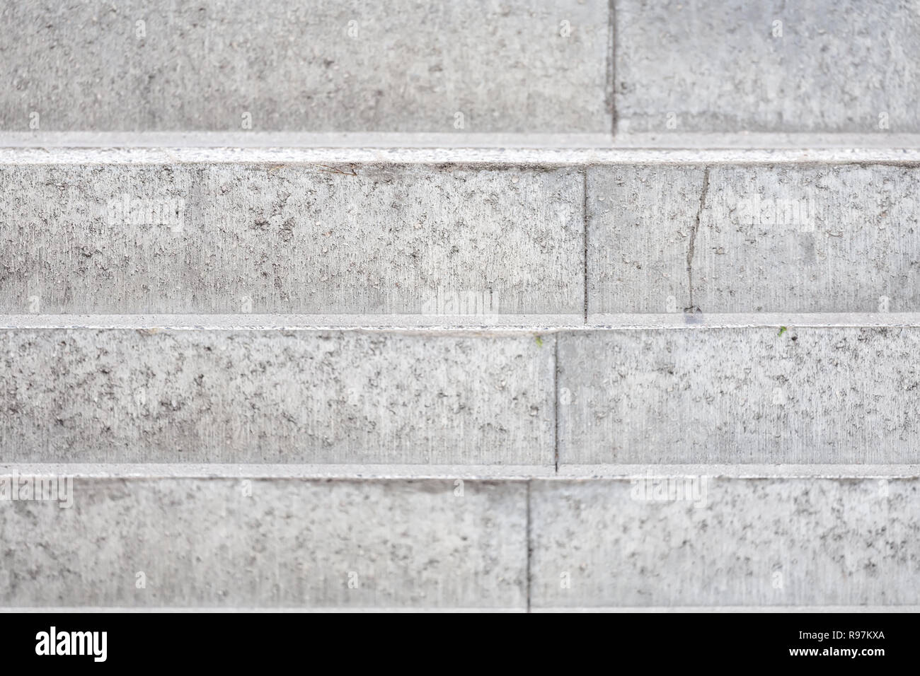 Abstract background - concrete light grey stairs. Selective focus. Stock Photo
