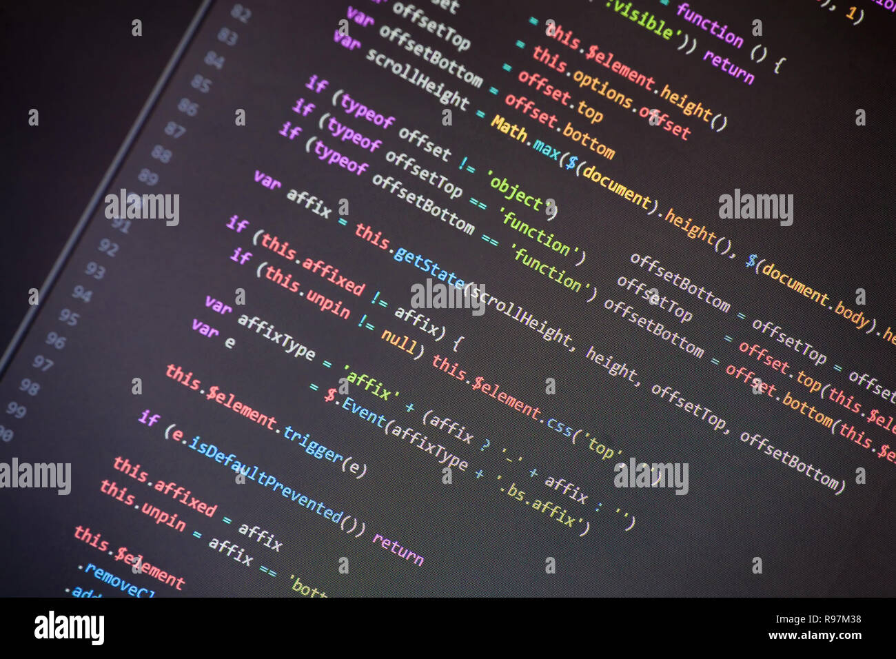 Colorful programming php and html source code on a monitor written by a ...
