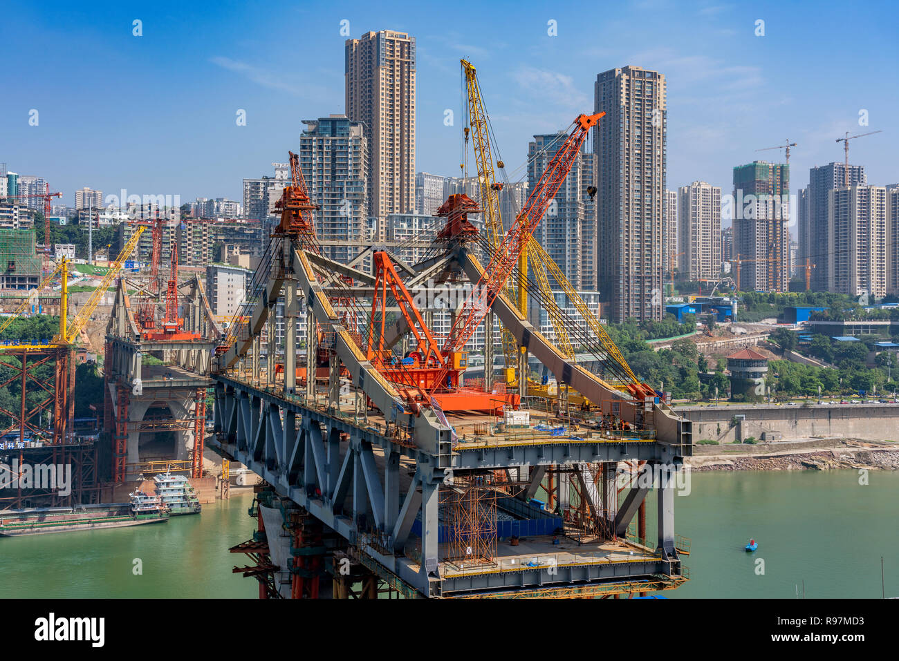 CHONGQING, CHINA - SEPTEMBER 19: View of a bridge under constuction along the Yangtze river in Chongqing on September 19, 2018 in Chognqing Stock Photo