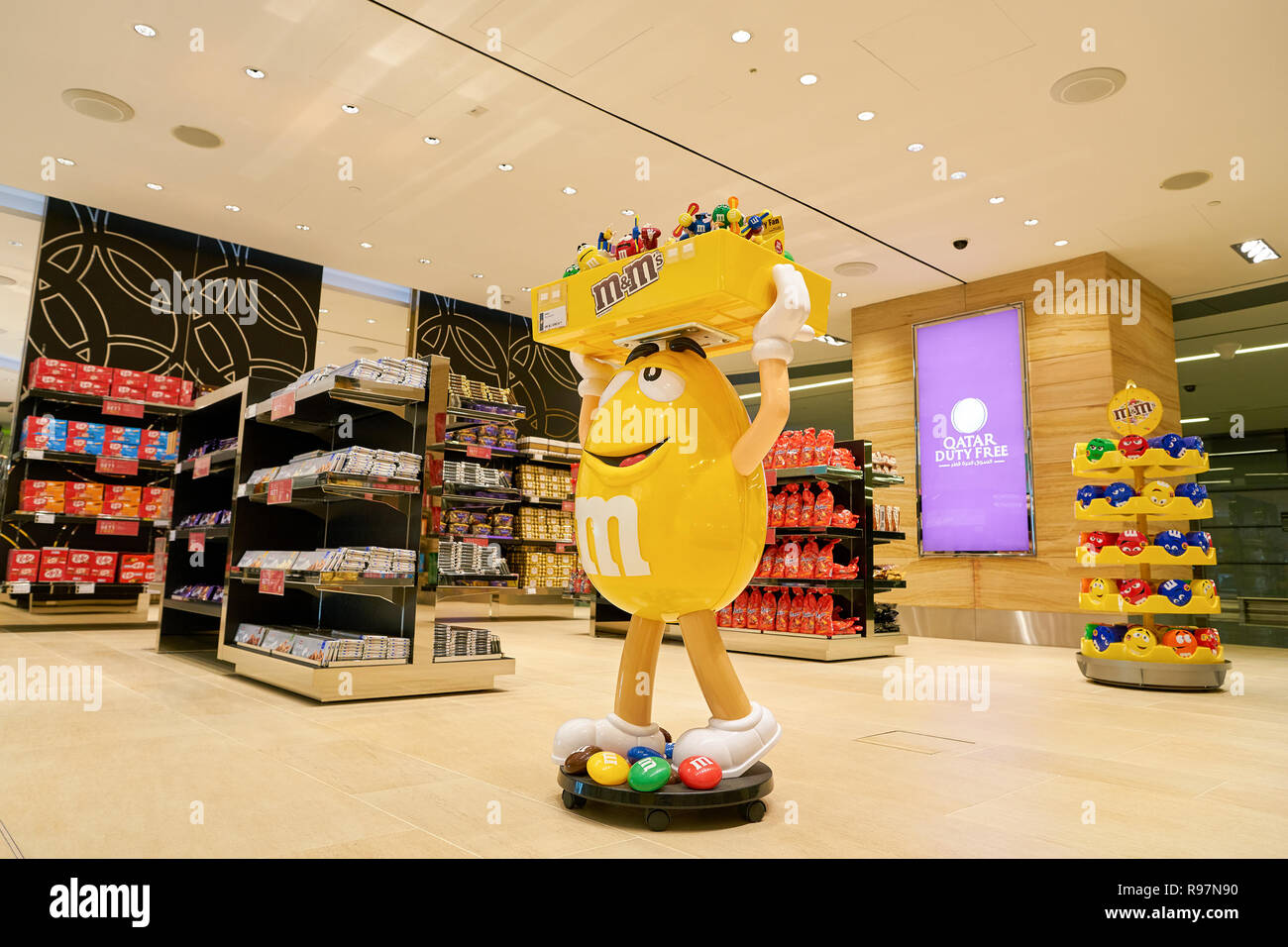 DOHA, QATAR CIRCA MAY, 2017 M&M candy yellow character on display at