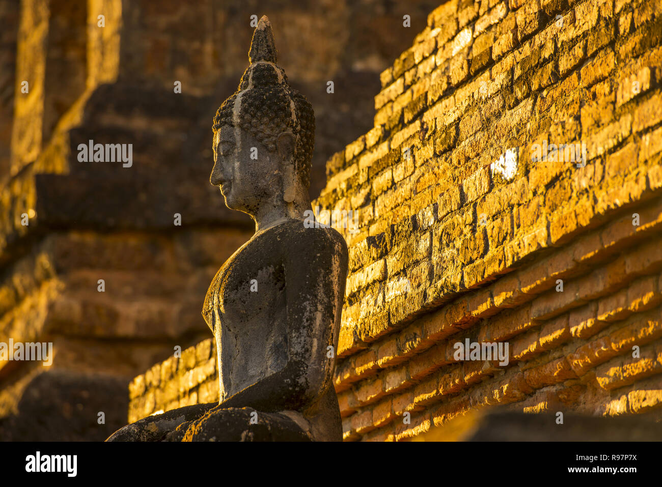 Sunlight covering into The statue of Buddha Thailand Stock Photo - Alamy