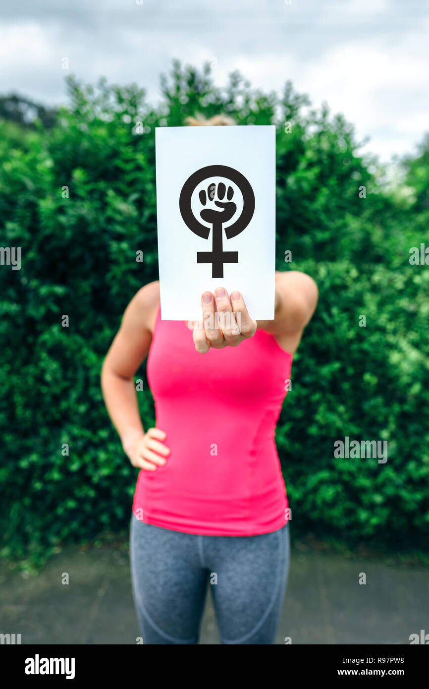 Woman showing symbol of feminism Stock Photo