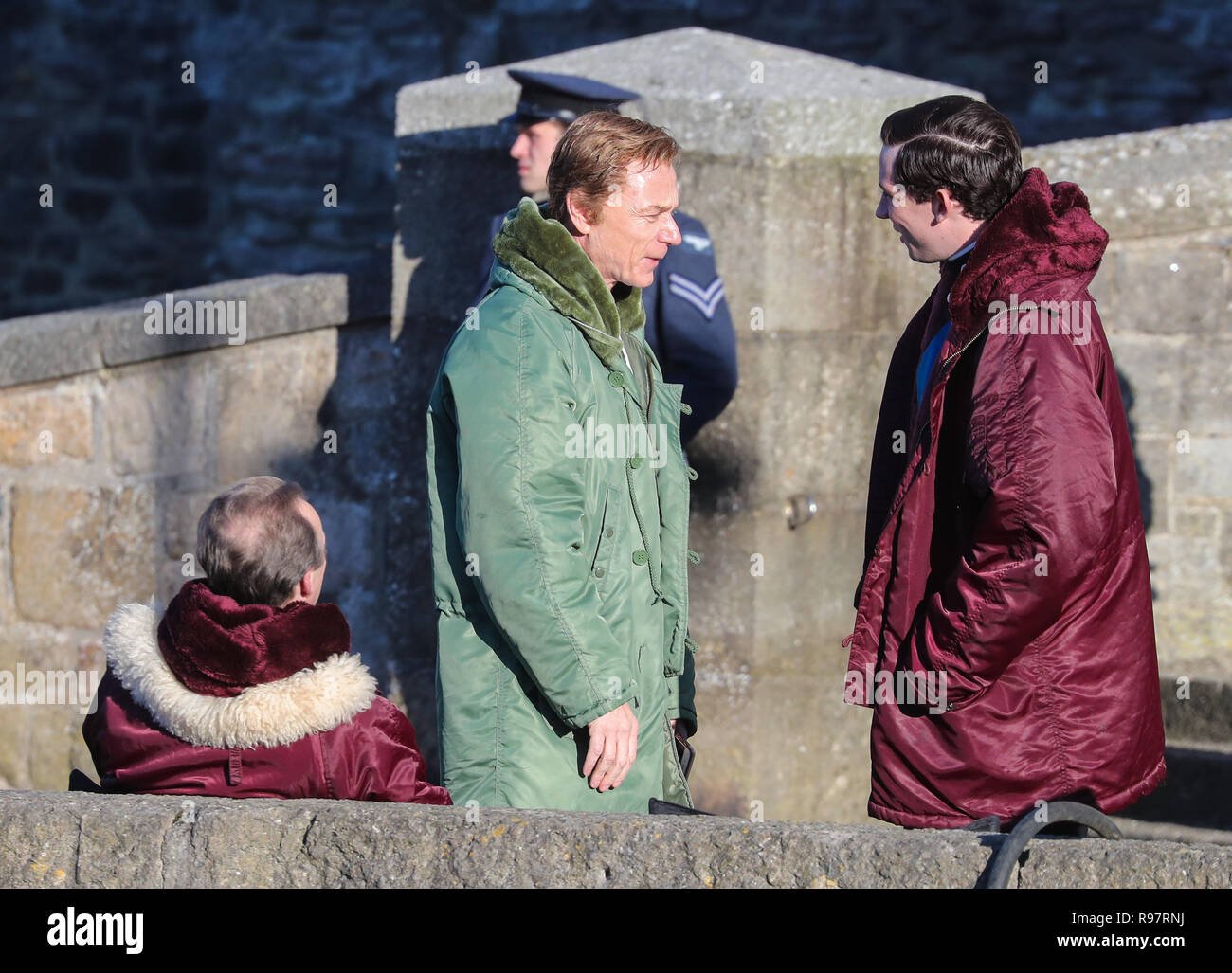 Josh O'Connor and Ben Daniels film a scene for the Netflix drama at Caernarfon Castle. Prince Charles is welcomed to Caernarfon Castle by Anthony Armstong-Jones, Lord Snowdon the Constable of Caernarfon Castle, ahead of his investiture.  Featuring: Ben Daniels, Josh O'Connor Where: Caernafon, Gwynedd, United Kingdom When: 18 Nov 2018 Credit: WENN.com Stock Photo