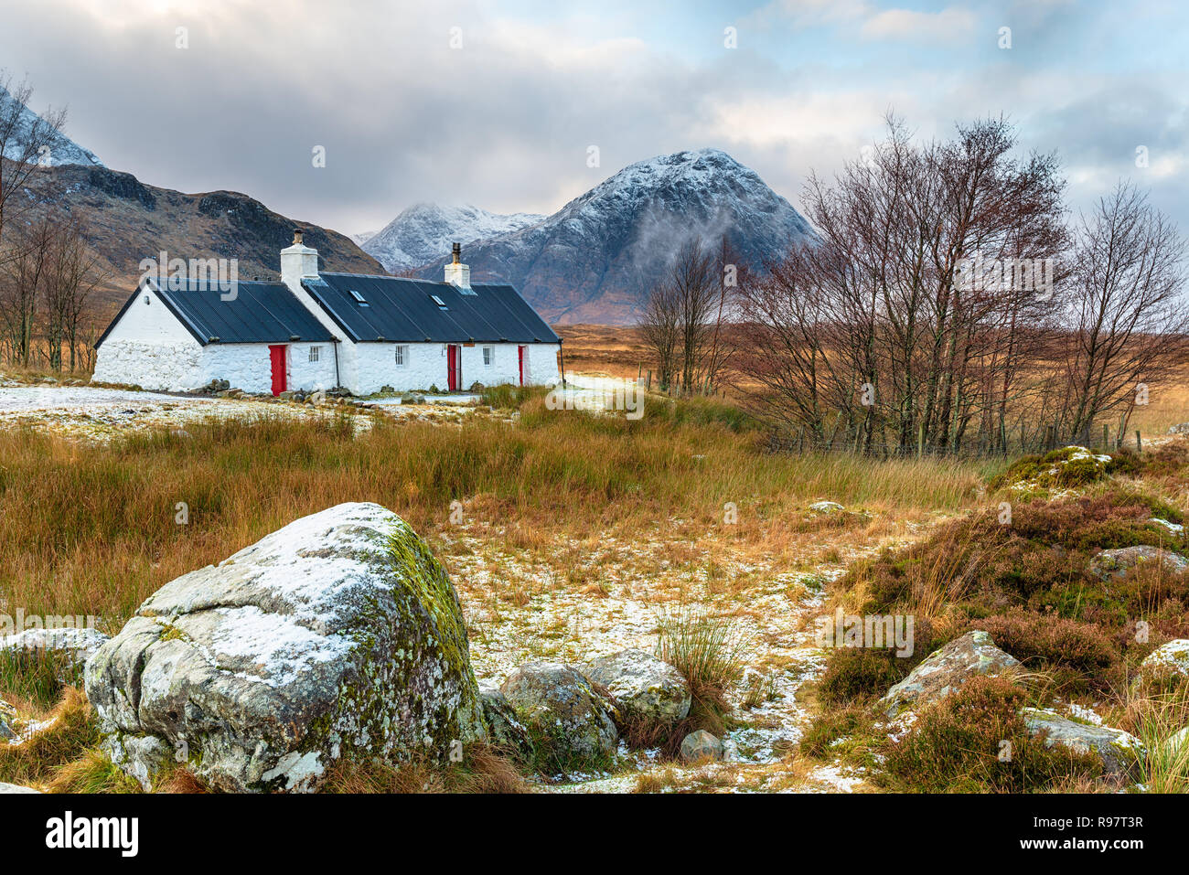 Blackrock cottage after a dusting of snow at Glencoe in the highlands of Scotland Stock Photo