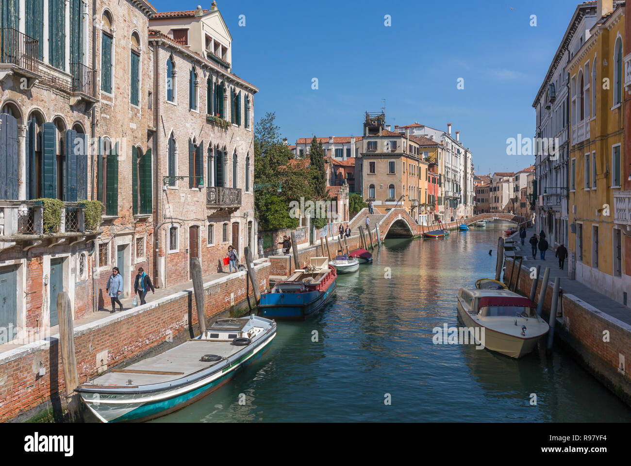 Venice, Italy - March 23, 2018: Day view of the side canal in Venice, Italy Stock Photo