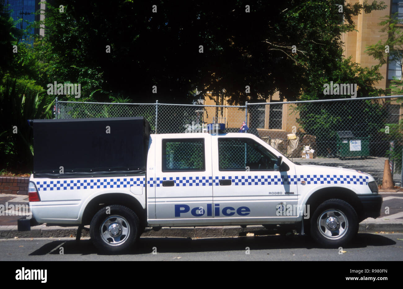 POLICE PATROL WAGON PARKED IN AN INNER CITY STREET, SYDNEY, NEW SOUTH WALES, AUSTRALIA Stock Photo